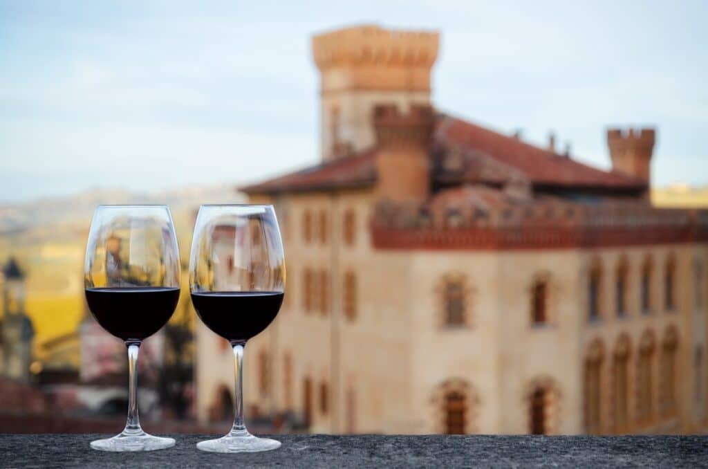 Two,Glasses,Of,Barolo,Wine,On,A,Windowsill,With,The